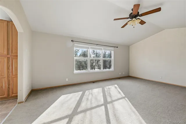 a view of a livingroom with a staircase