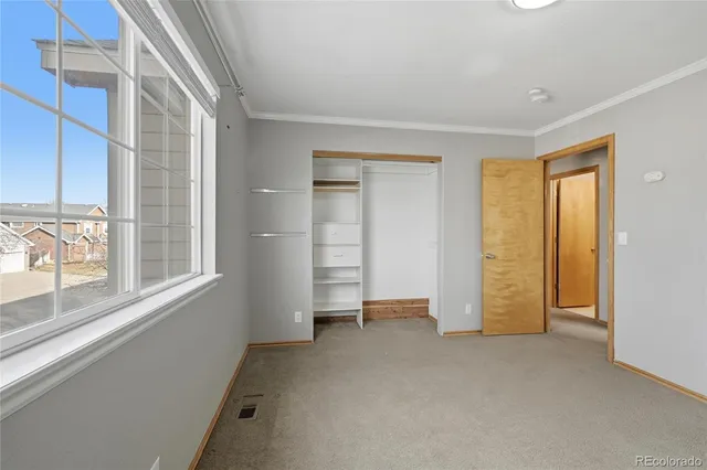 a bathroom with a granite countertop sink a mirror and a bathtub