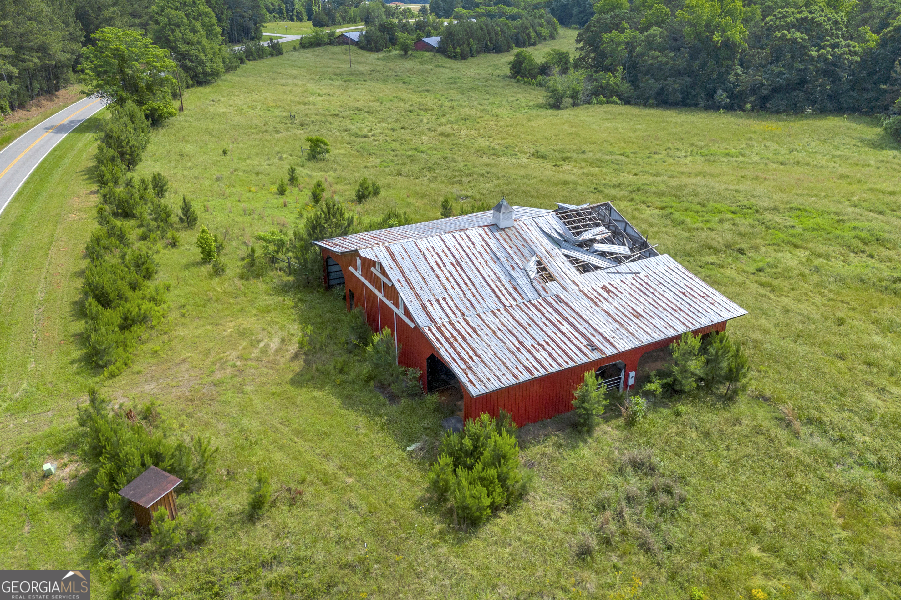 366 Lexington-Carlton Road Lexington, GA 30648 - Photo 7 of 20 a view of a back yard of the house with green space
