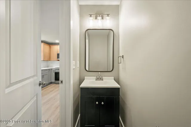 an aerial view of a house with a yard and outdoor seating