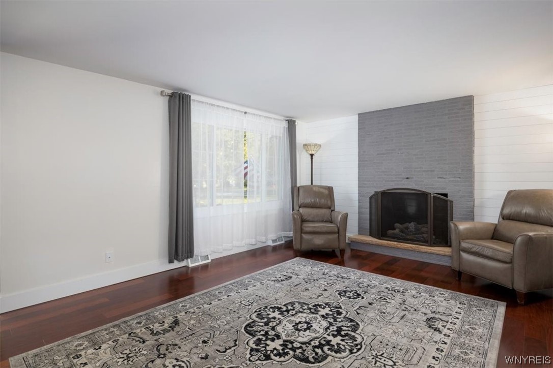 234 Ayer Road Amherst, NY 14221 - Photo 3 of 25 Enter the front foyer to a large living room.