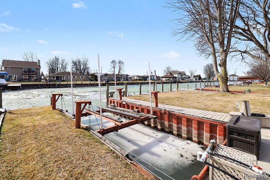 7277 Cardinal Road Algonac, MI 48001 - Photo 2 of 36 Dock with a yard, a water view, and a residential view