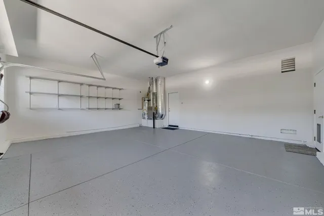 a view of backyard with outdoor seating and green space