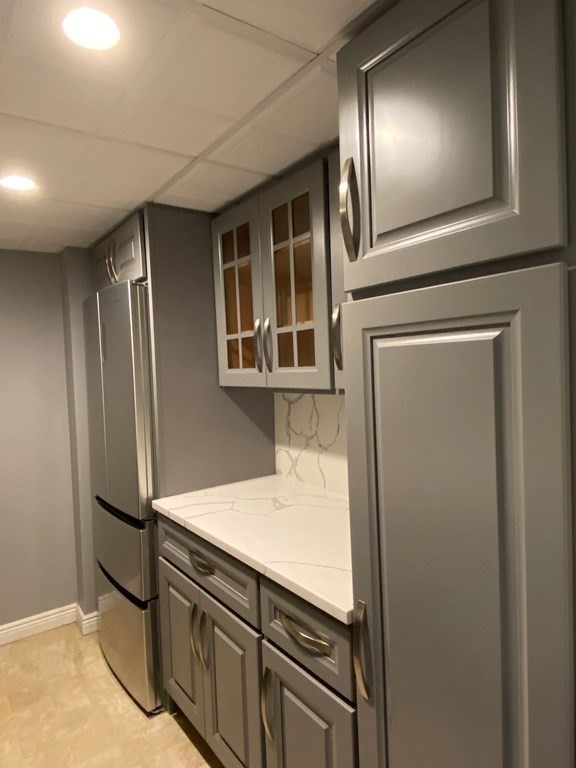 466 Commonwealth Avenue, Unit 503 Boston, MA 02215 - Photo 4 of 17 a view of kitchen with cabinets and refrigerator