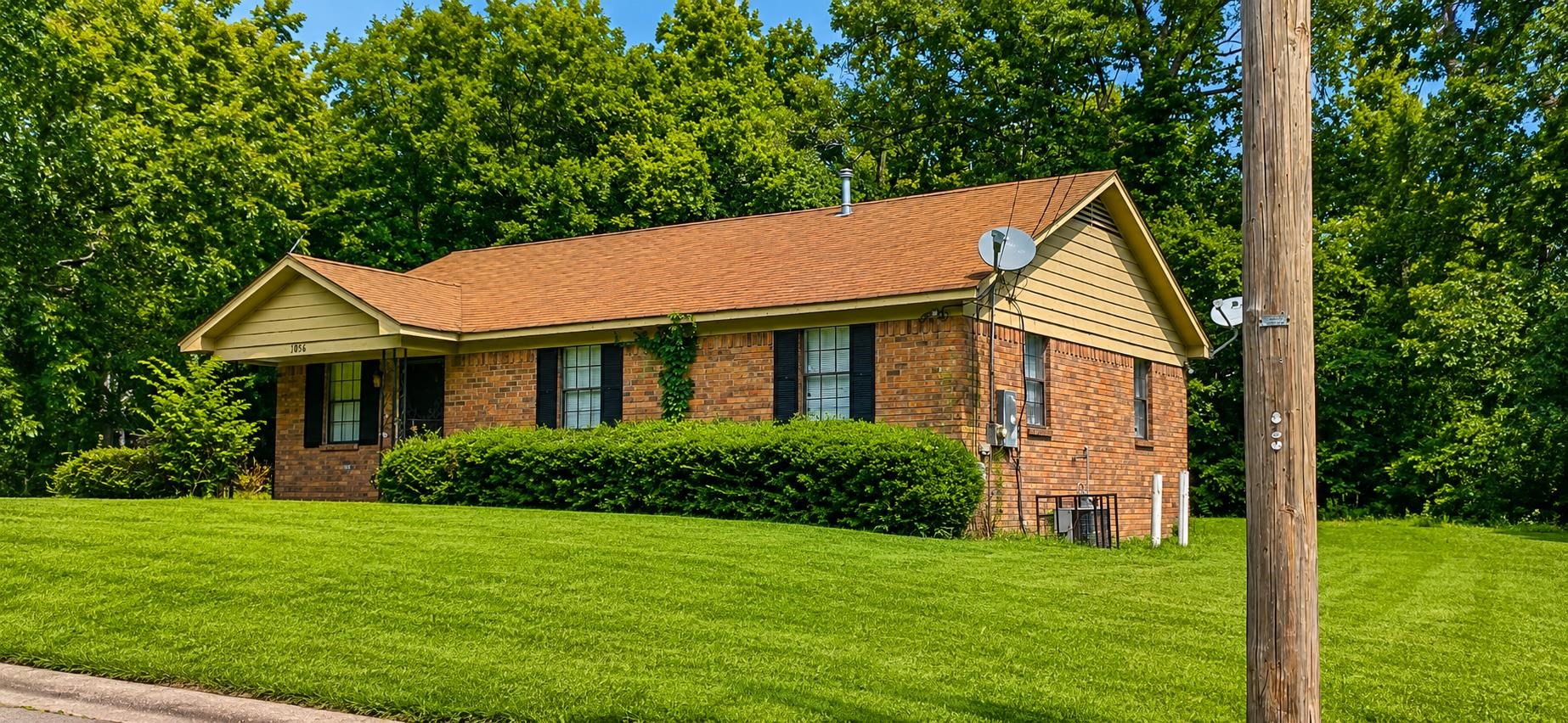 1056 Walk Road Memphis, TN 38109 - Photo 2 of 2 a aerial view of a house with garden