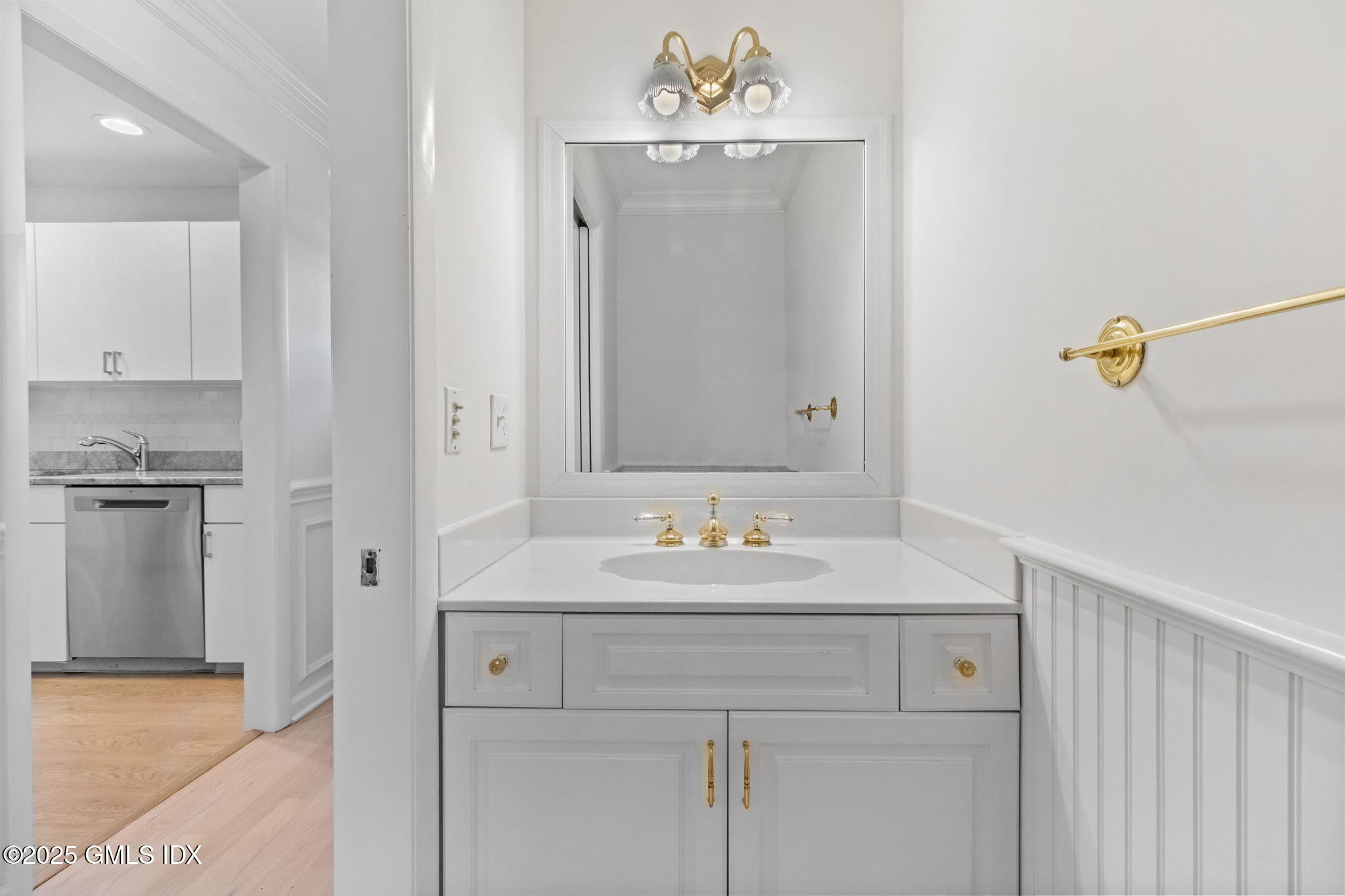 83 Silo Circle Riverside, CT 06878 - Photo 11 of 30 a bathroom with a sink and a mirror