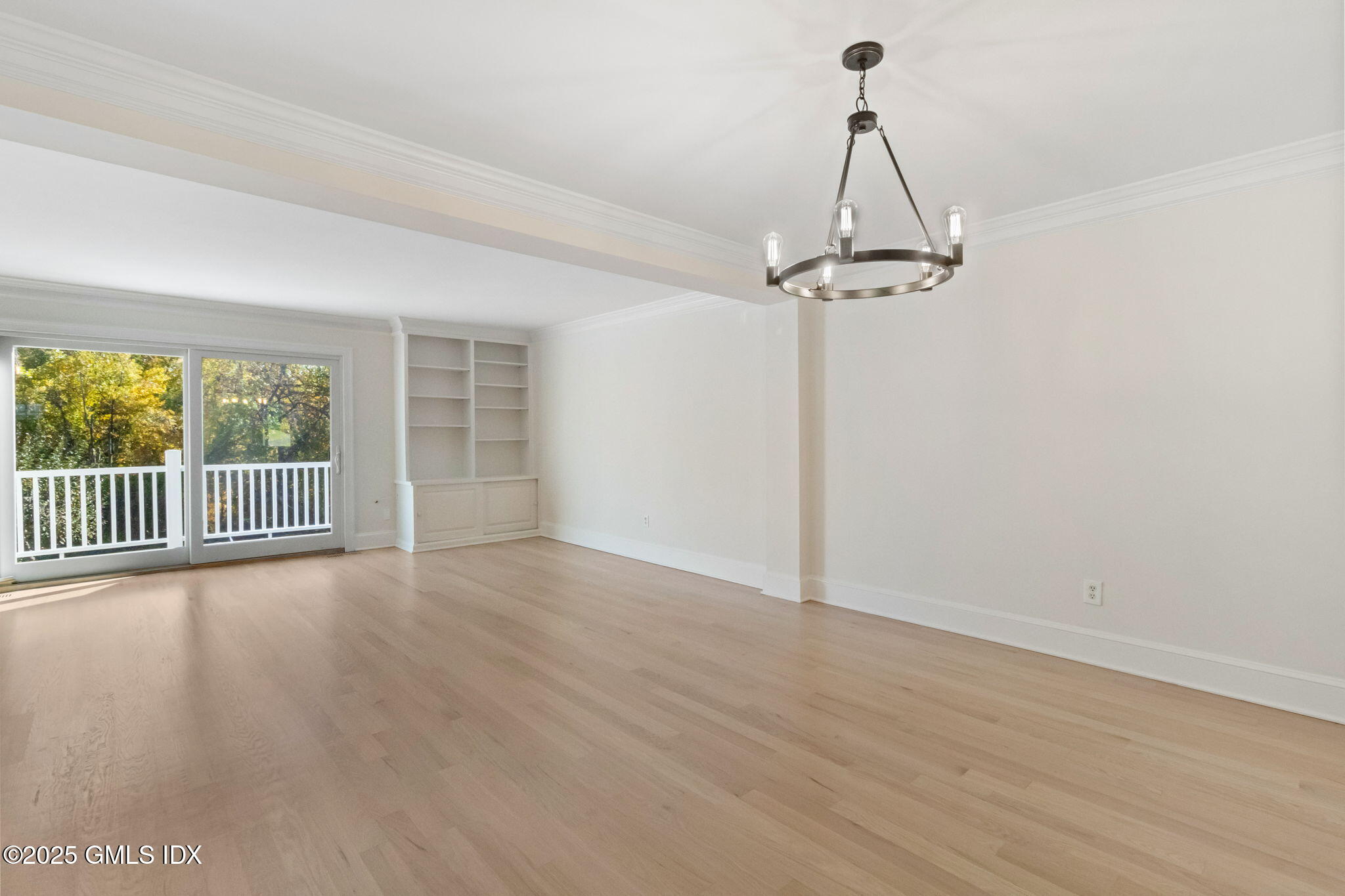 83 Silo Circle Riverside, CT 06878 - Photo 12 of 30 a view of a room with wooden floor and a window