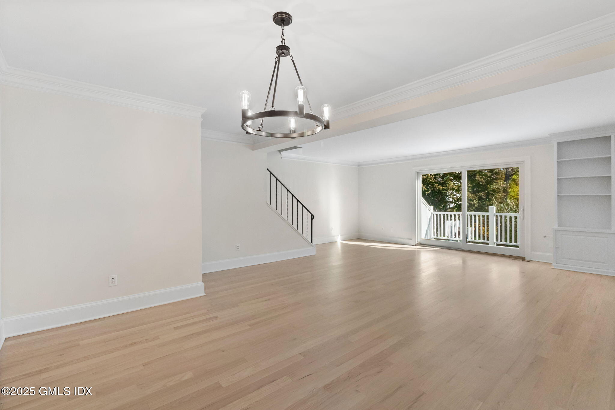 83 Silo Circle Riverside, CT 06878 - Photo 13 of 30 a view of a room with wooden floor water view and windows