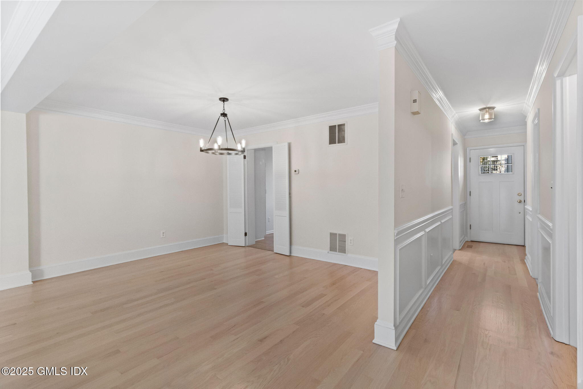83 Silo Circle Riverside, CT 06878 - Photo 14 of 30 a view of a hallway with wooden floor