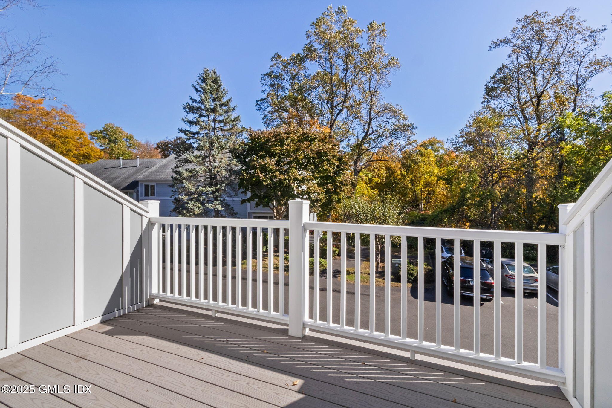 83 Silo Circle Riverside, CT 06878 - Photo 17 of 30 a view of a wooden roof deck