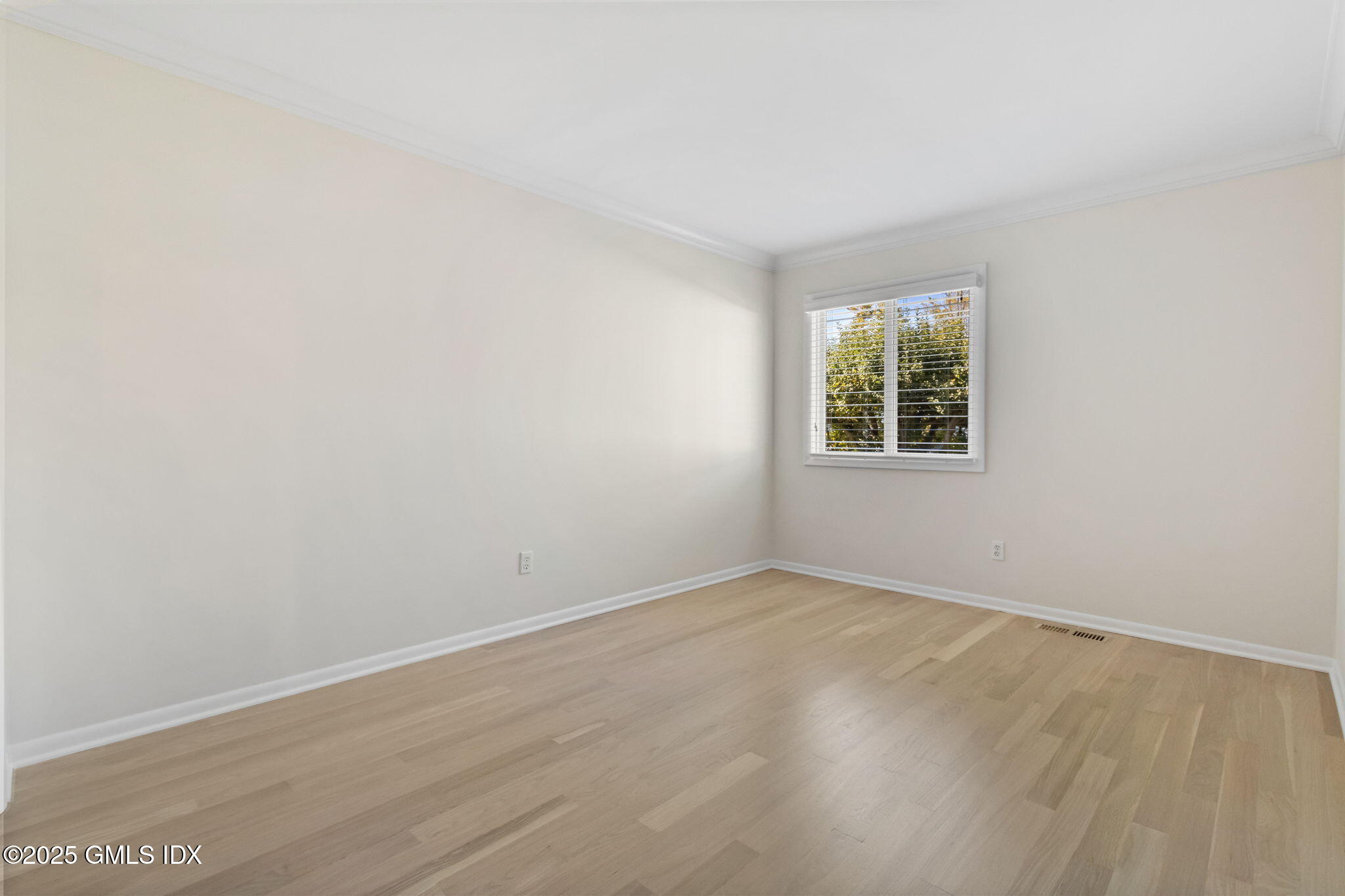 83 Silo Circle Riverside, CT 06878 - Photo 24 of 30 an empty room with windows