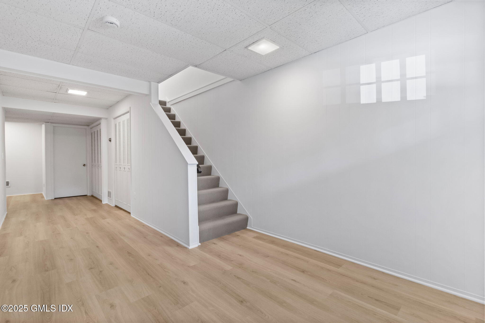 83 Silo Circle Riverside, CT 06878 - Photo 26 of 30 a view of entryway and hall with wooden floor