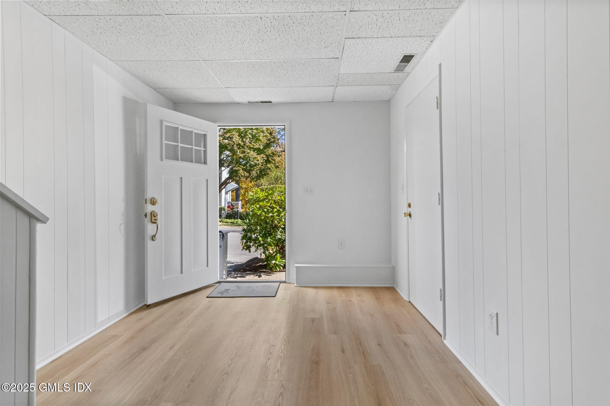 83 Silo Circle Riverside, CT 06878 - Photo 27 of 30 a view of entryway with wooden floor
