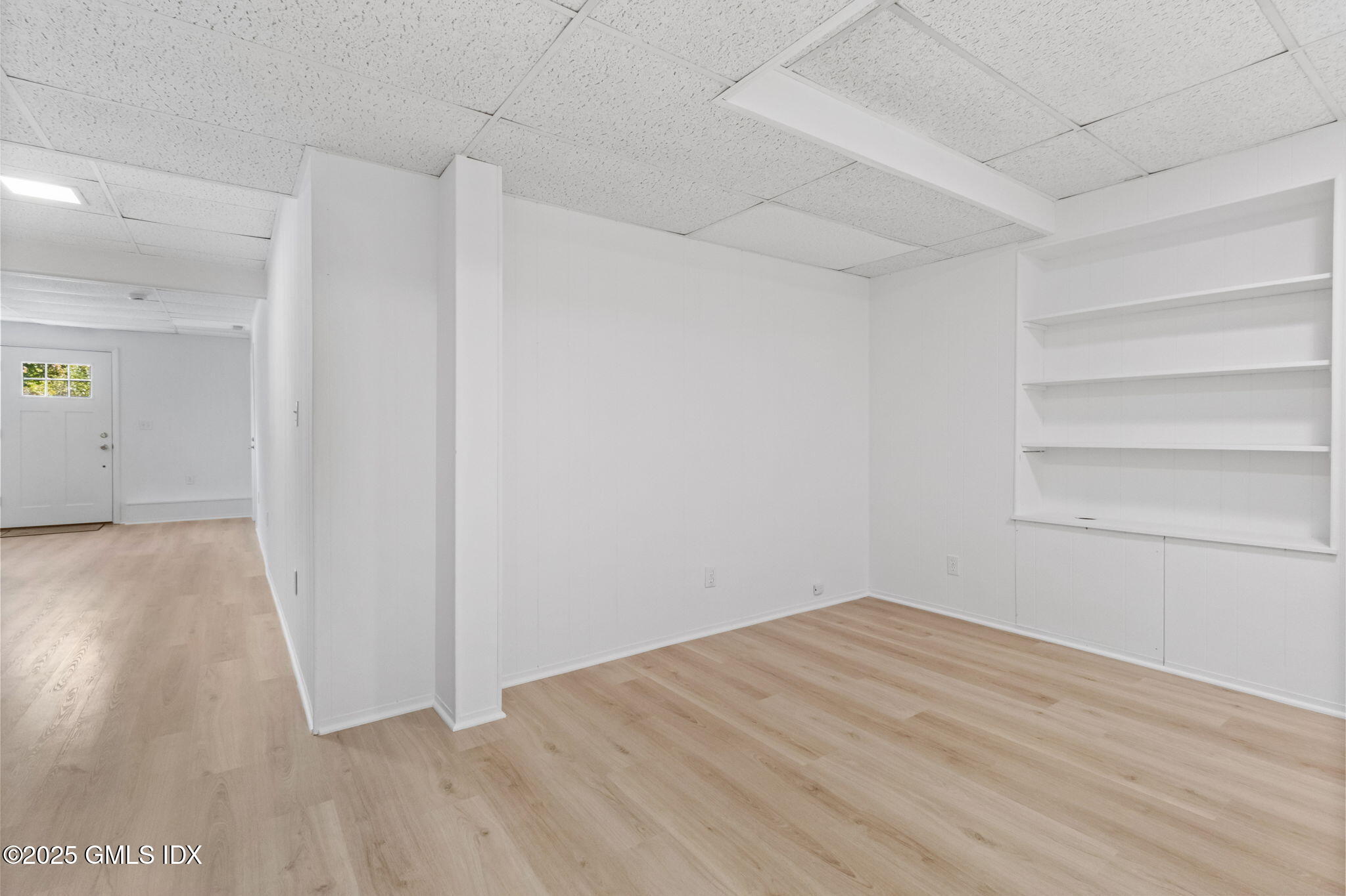 83 Silo Circle Riverside, CT 06878 - Photo 28 of 30 a view of empty room with wooden floor