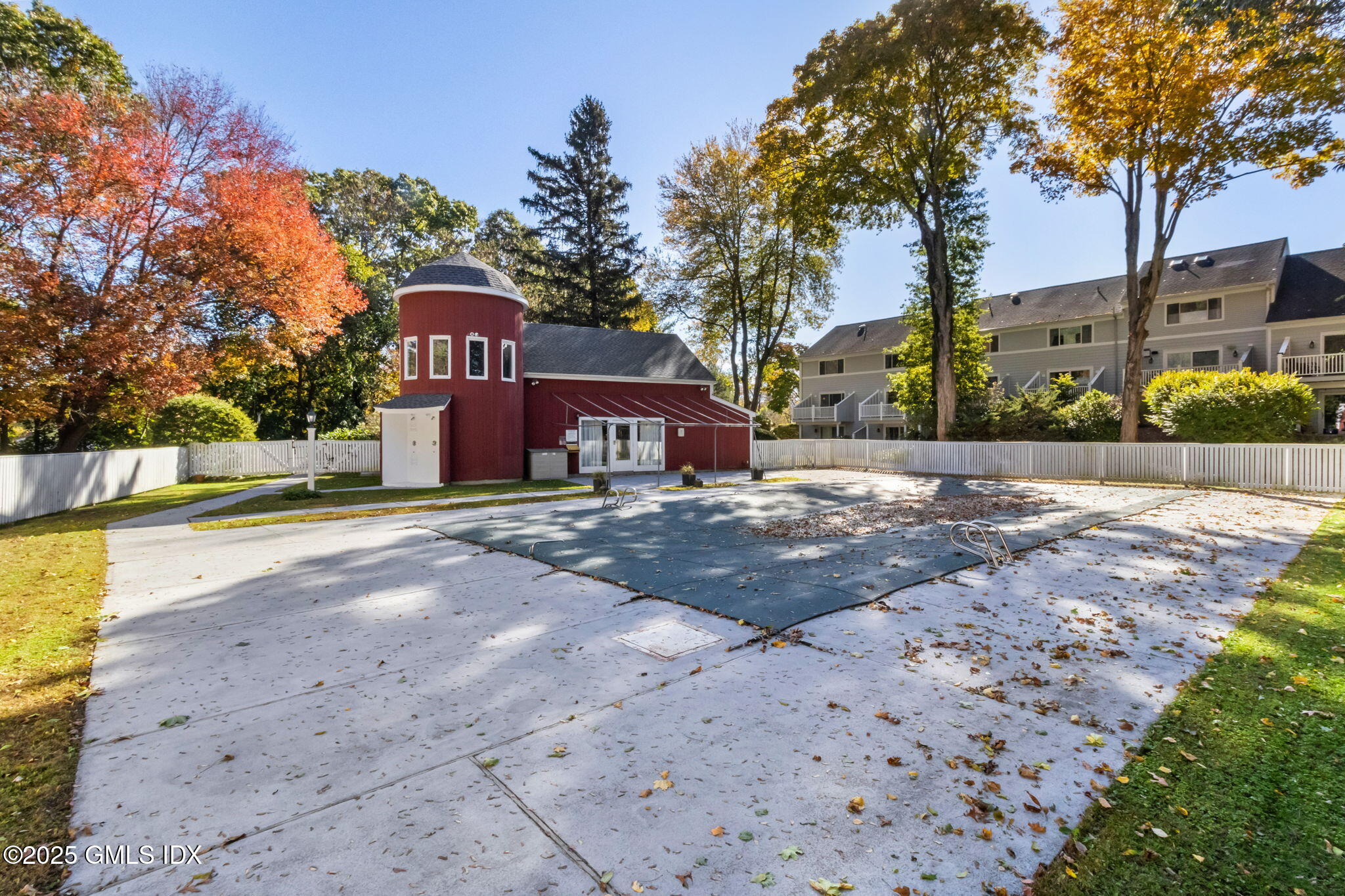 83 Silo Circle Riverside, CT 06878 - Photo 30 of 30 a front view of a house with a yard and large trees