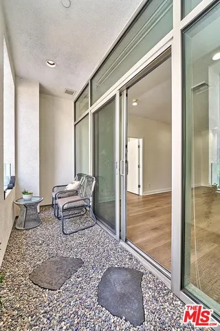 a lobby with furniture and window