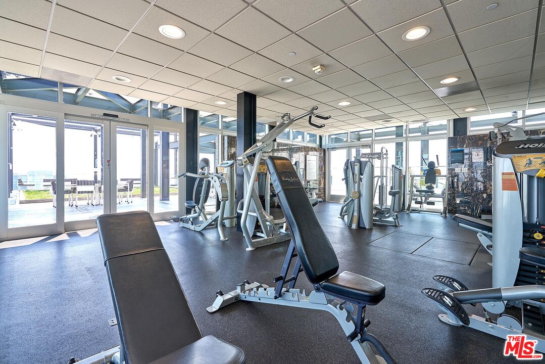 3810 Wilshire Boulevard, Unit 404 Los Angeles, CA 90010 - Photo 39 of 43 a view of a room with gym equipment