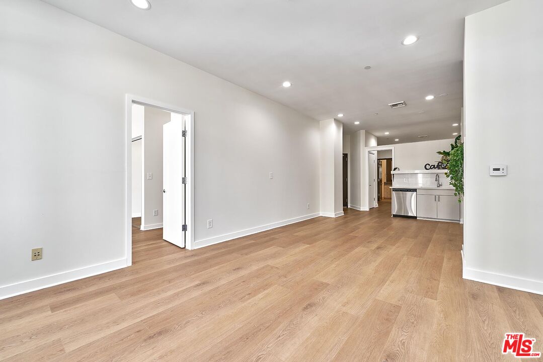 3810 Wilshire Boulevard, Unit 404 Los Angeles, CA 90010 - Photo 10 of 43 a view of empty room with wooden floor