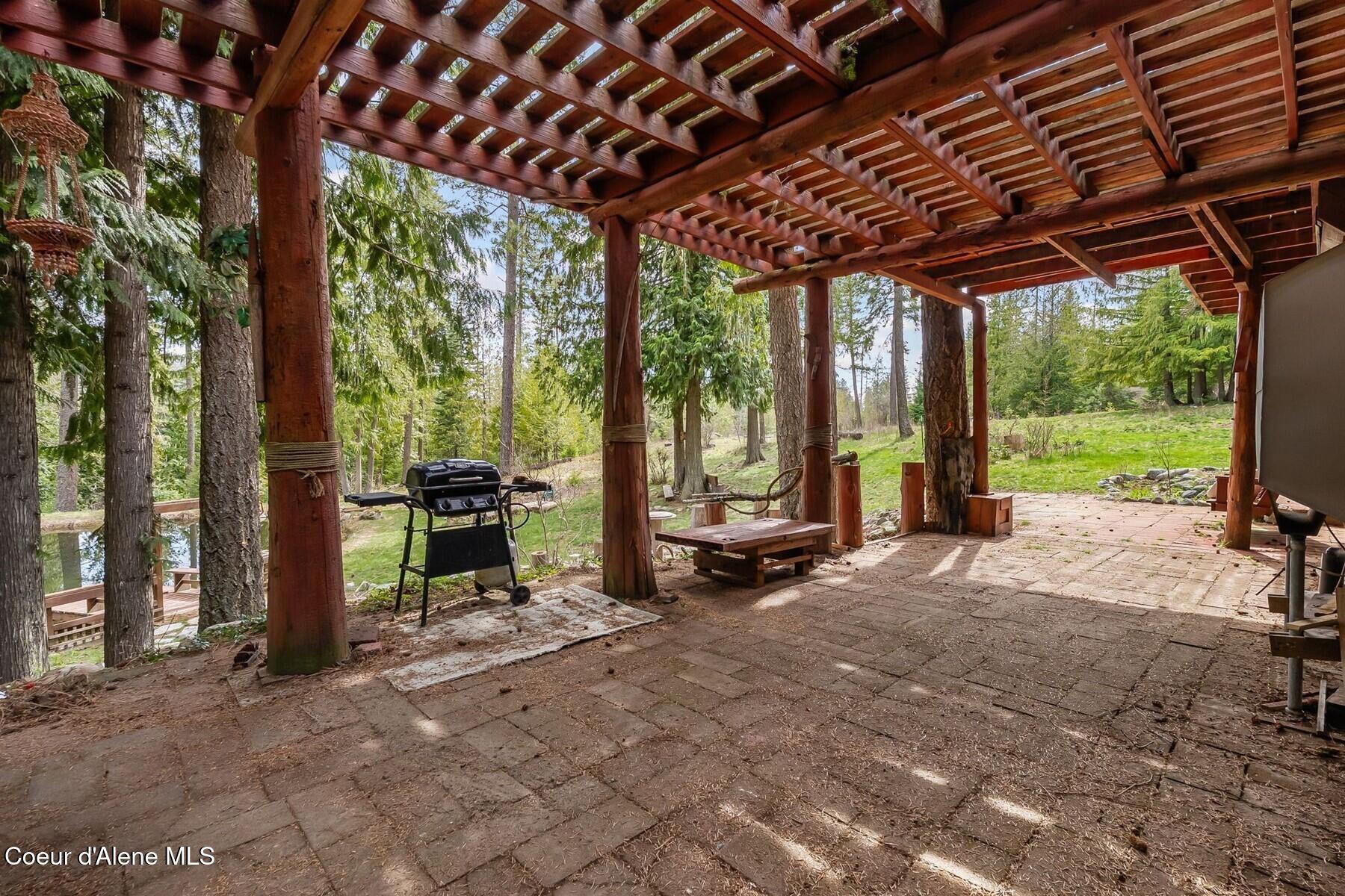 177 Hawkins Spur Road Sagle, ID 83860 - Photo 37 of 70 Patio wPergola - Outdoor Dining