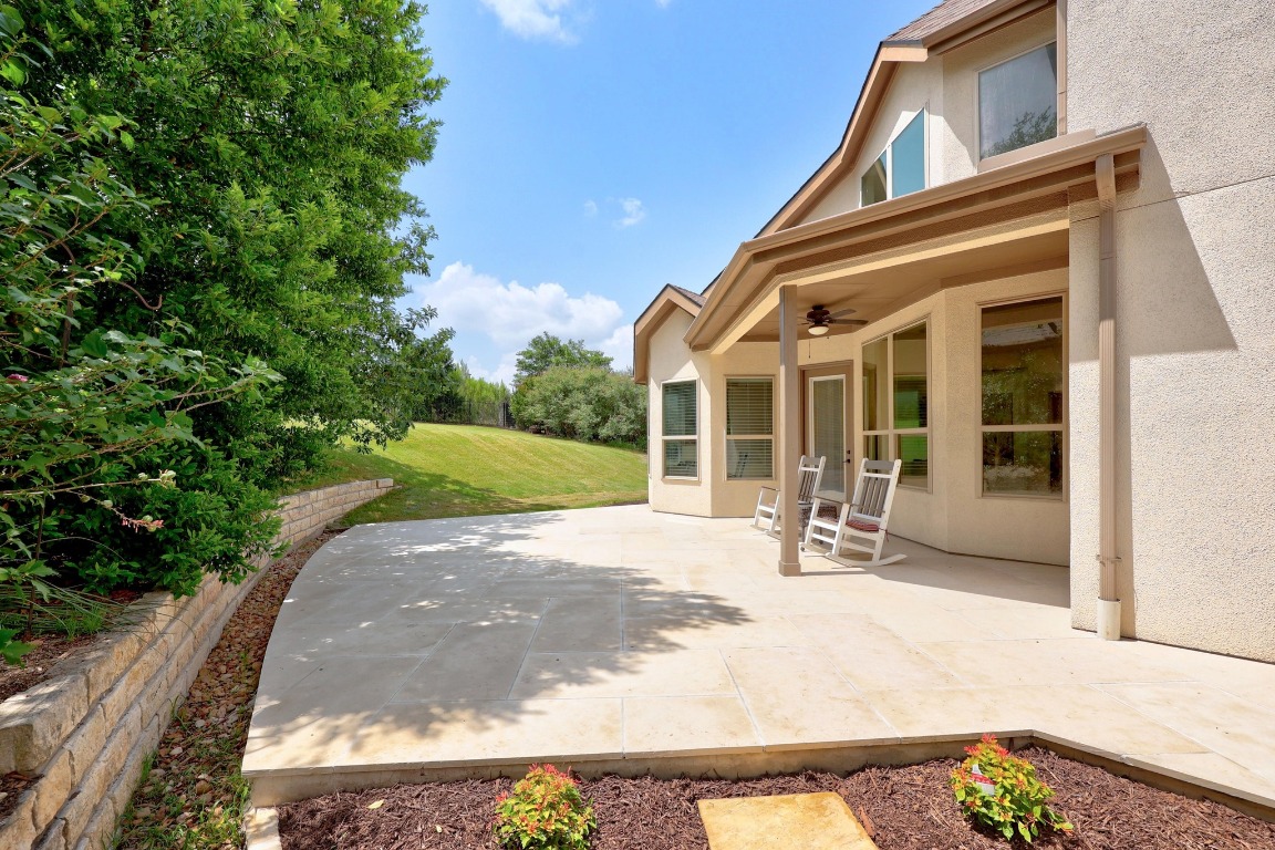 106 Tonkawa Trail West Austin, TX 78738 - Photo 36 of 39 a view of a chair with a outdoor space