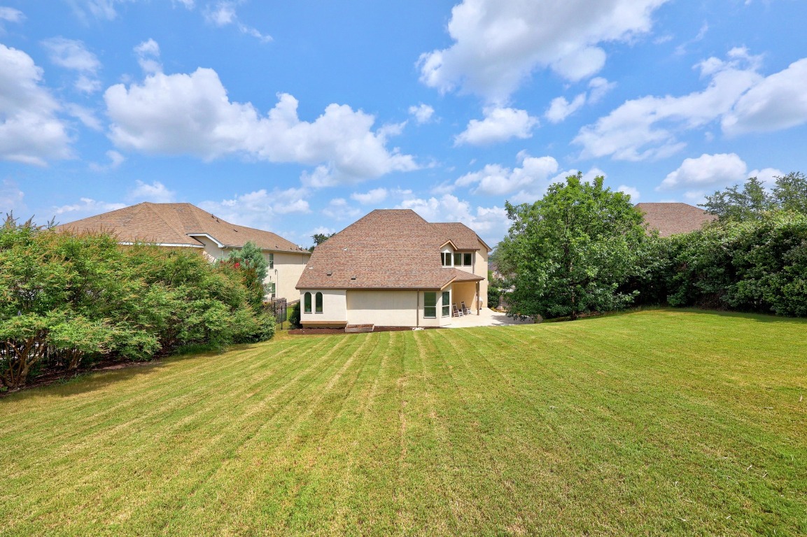 106 Tonkawa Trail West Austin, TX 78738 - Photo 39 of 39 a view of an house with backyard and garden