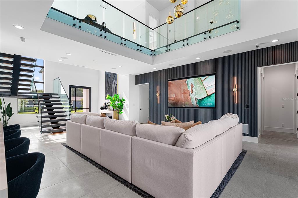 2519 North Riverside Drive Tampa, FL 33602 - Photo 11 of 34 a living room with furniture and a flat screen tv