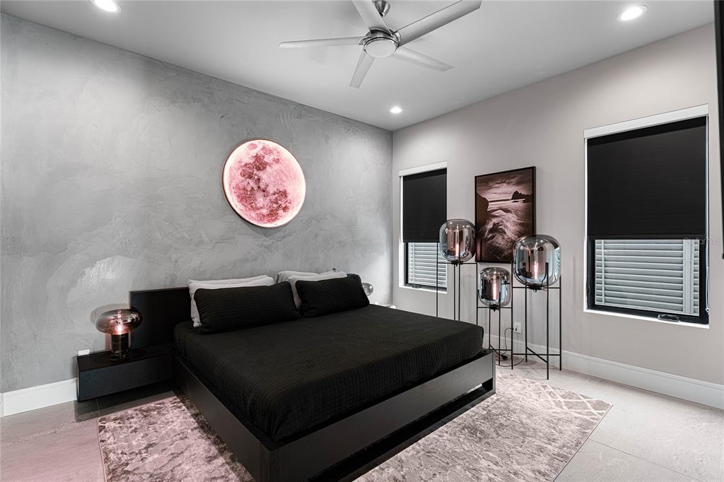 2519 North Riverside Drive Tampa, FL 33602 - Photo 22 of 34 a bedroom with a bed and a flat screen tv