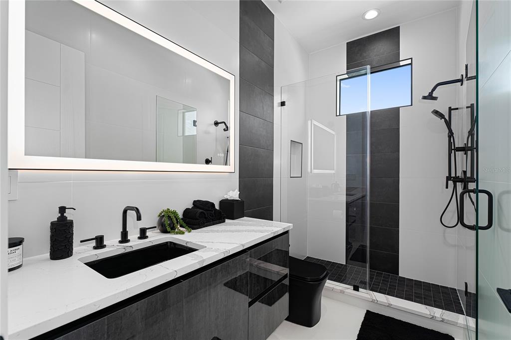 2519 North Riverside Drive Tampa, FL 33602 - Photo 27 of 34 a kitchen with a sink and a refrigerator