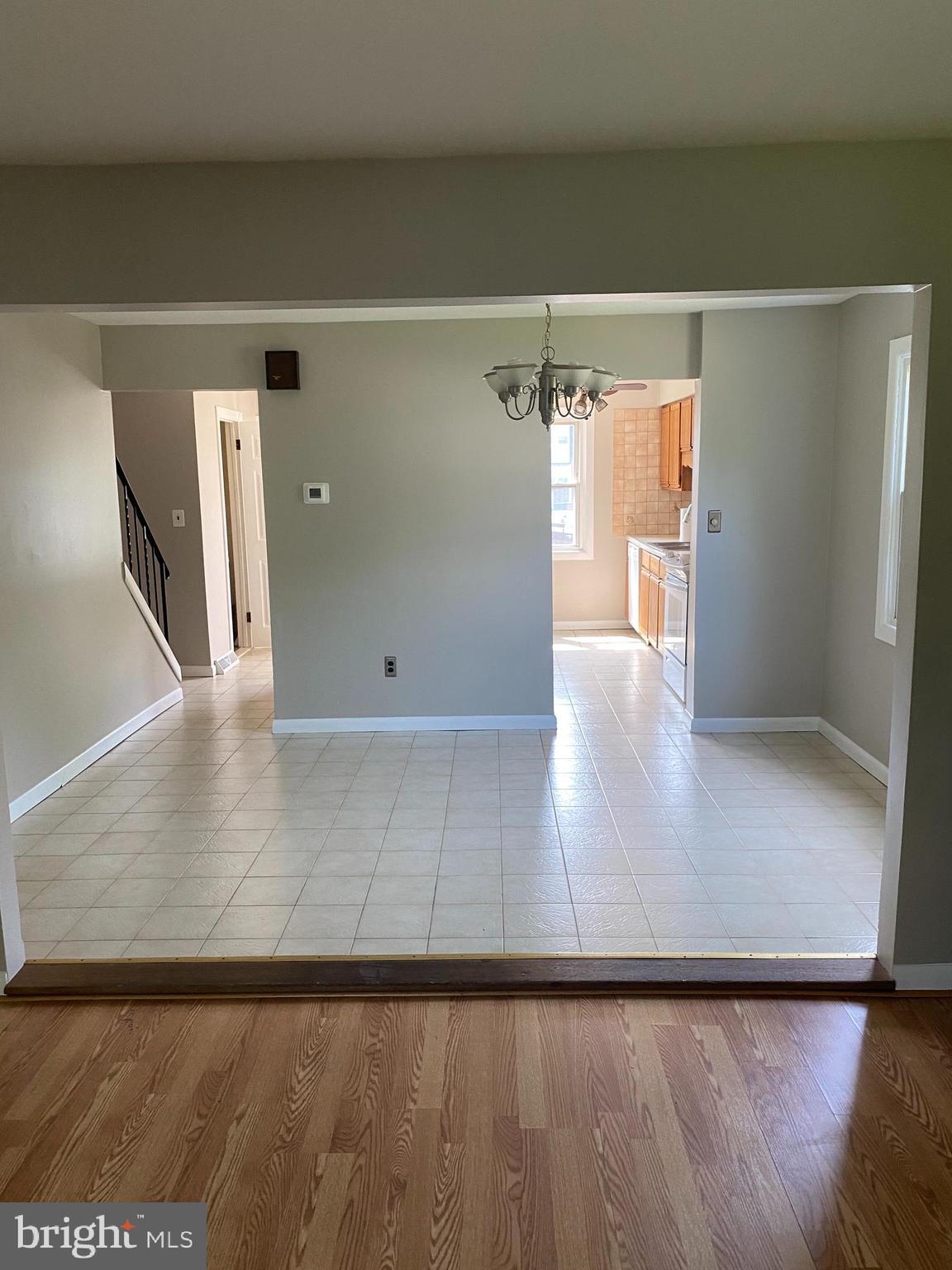 136-138 Reeger Avenue Hamilton, NJ 08610 - Photo 5 of 18 an empty room with wooden floor and closet
