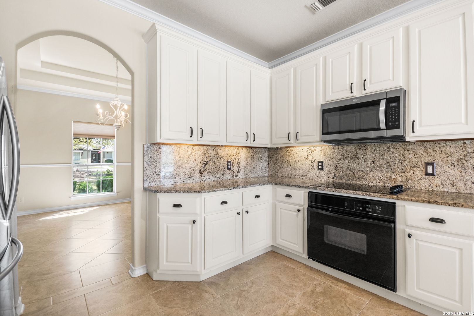 108 Jackrabbit Circle Boerne, TX 78006 - Photo 28 of 50 a kitchen with granite countertop white cabinets and stainless steel appliances