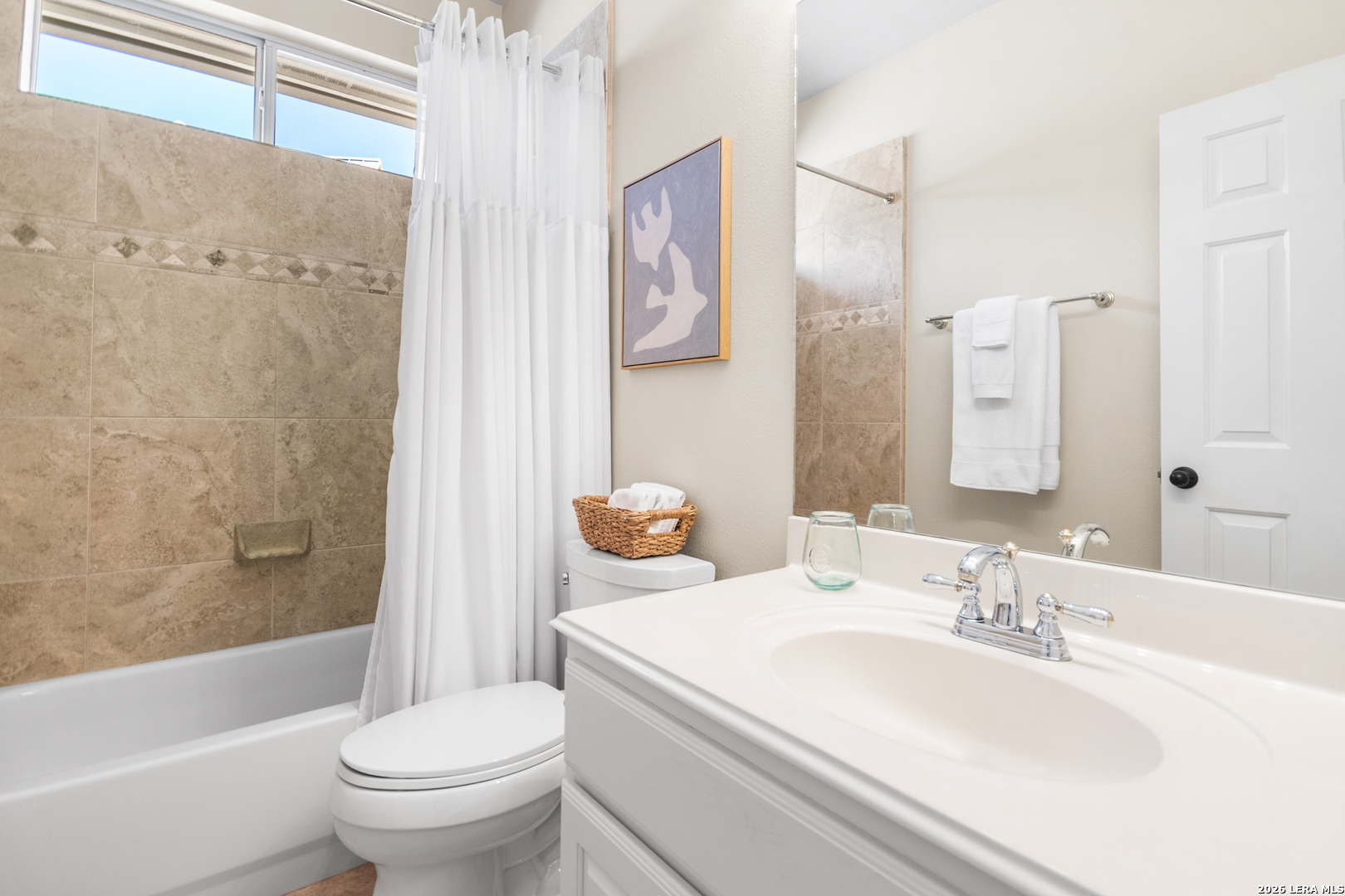 108 Jackrabbit Circle Boerne, TX 78006 - Photo 37 of 50 a bathroom with a granite countertop toilet sink and mirror