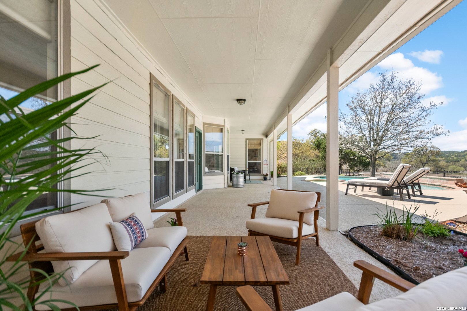 108 Jackrabbit Circle Boerne, TX 78006 - Photo 38 of 50 a balcony with furniture and a potted plant