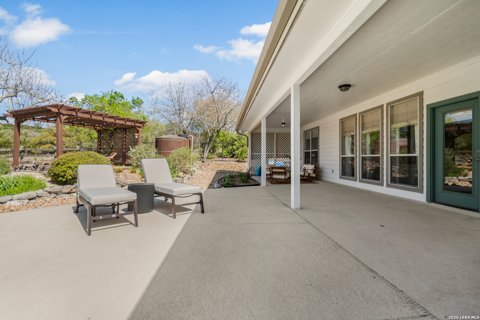 108 Jackrabbit Circle Boerne, TX 78006 - Photo 42 of 50 a building outdoor space with patio furniture and potted plants