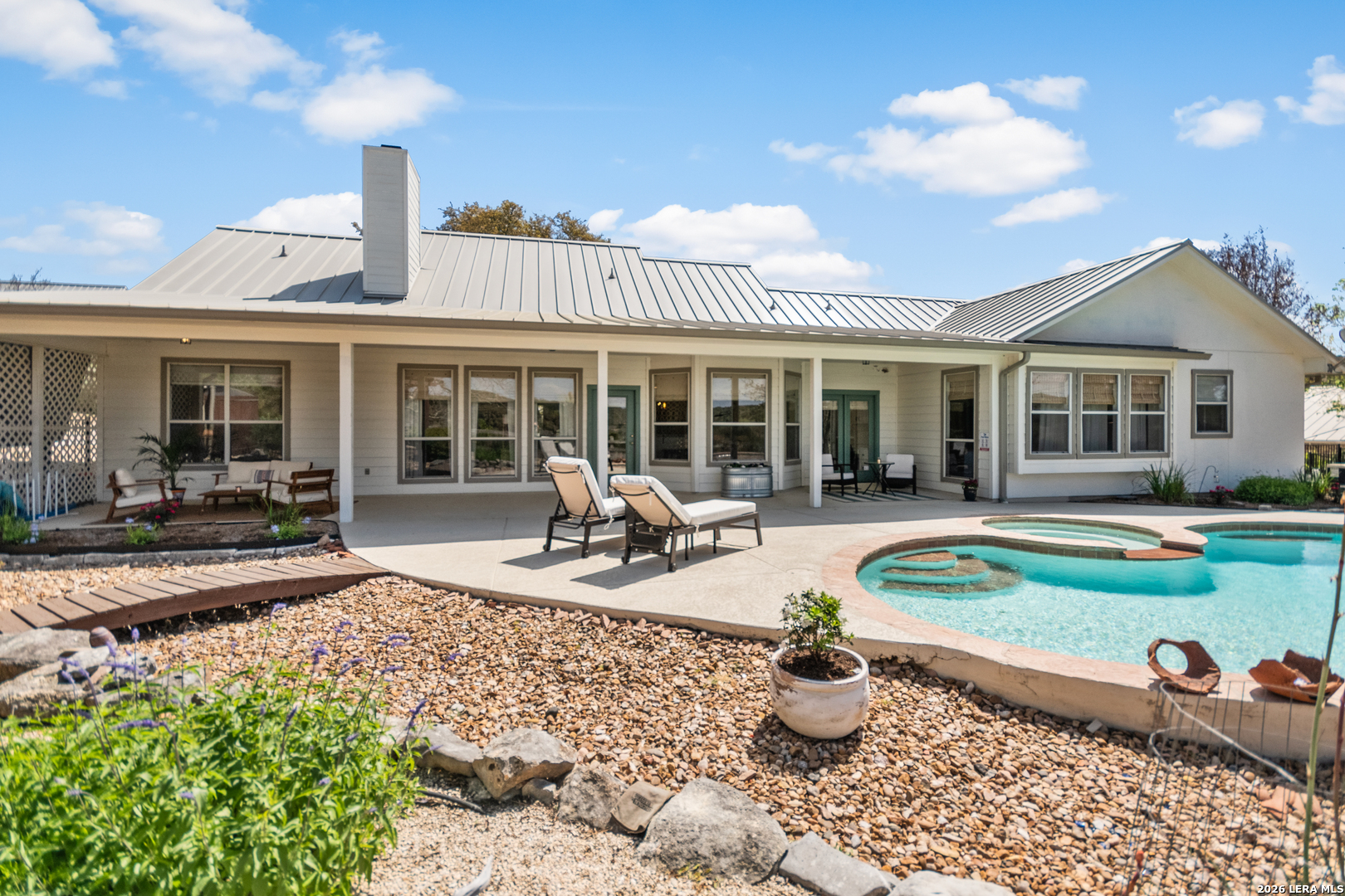 108 Jackrabbit Circle Boerne, TX 78006 - Photo 46 of 50 a view of a house with lounge chair and potted plants