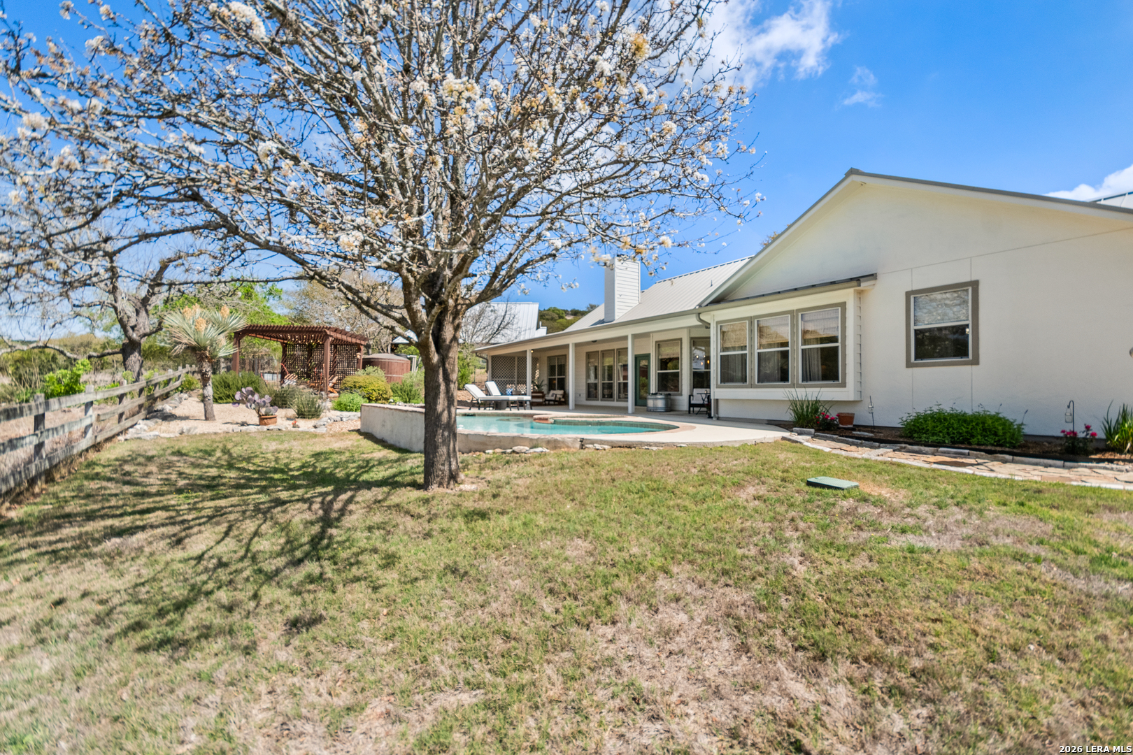 108 Jackrabbit Circle Boerne, TX 78006 - Photo 47 of 50 a house view with swimming pool in front of it
