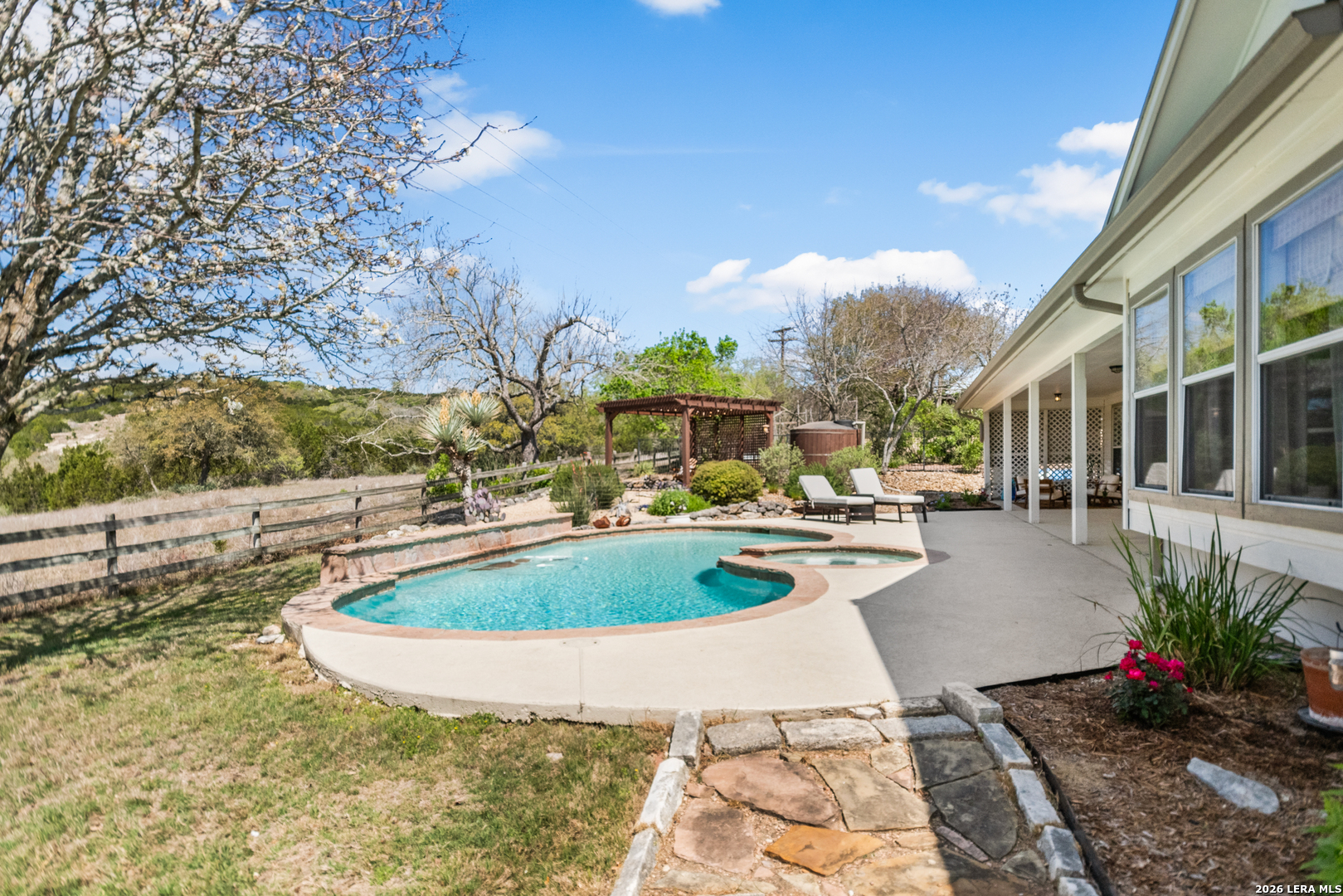 108 Jackrabbit Circle Boerne, TX 78006 - Photo 48 of 50 a view of a swimming pool with a patio