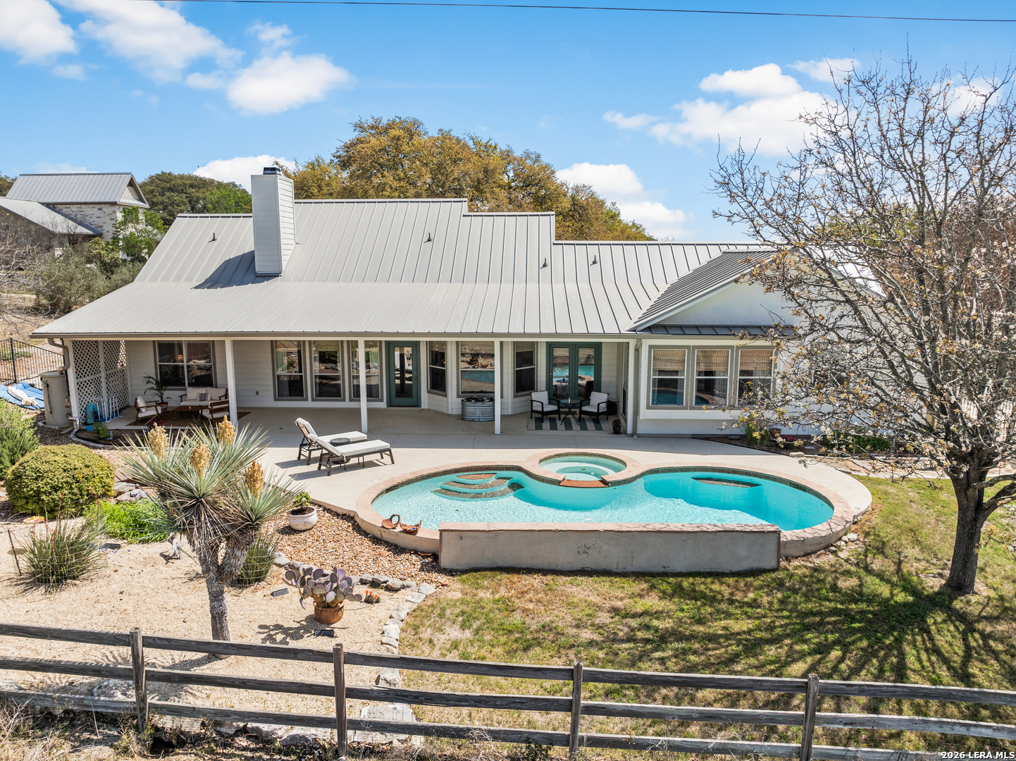 108 Jackrabbit Circle Boerne, TX 78006 - Photo 5 of 50 a view of house with swimming pool and outdoor seating