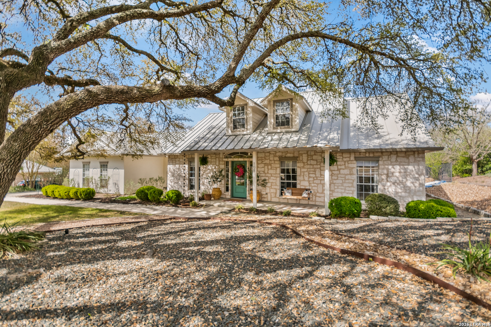 108 Jackrabbit Circle Boerne, TX 78006 - Photo 9 of 50 a front view of a house with a yard
