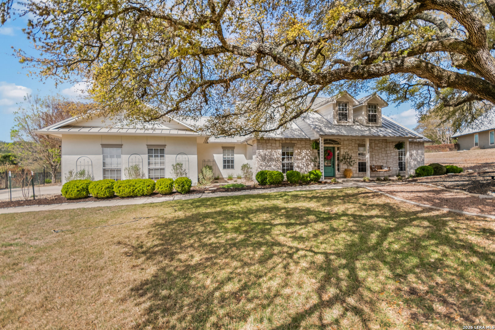 108 Jackrabbit Circle Boerne, TX 78006 - Photo 10 of 50 a front view of a house with a garden