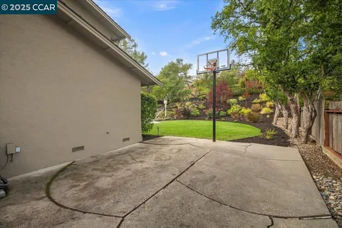 a view of a backyard with a garden