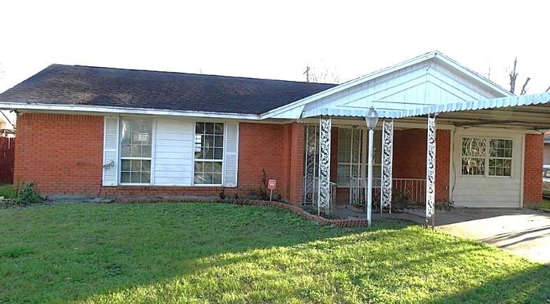 9938 Kittrell Street Houston, TX 77034 - Photo 1 of 12 a front view of house with yard and green space