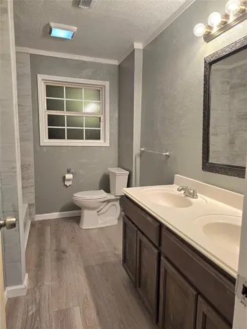 a bathroom with a sink and a large mirror
