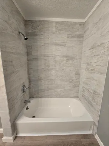 a bathroom with a bathtub