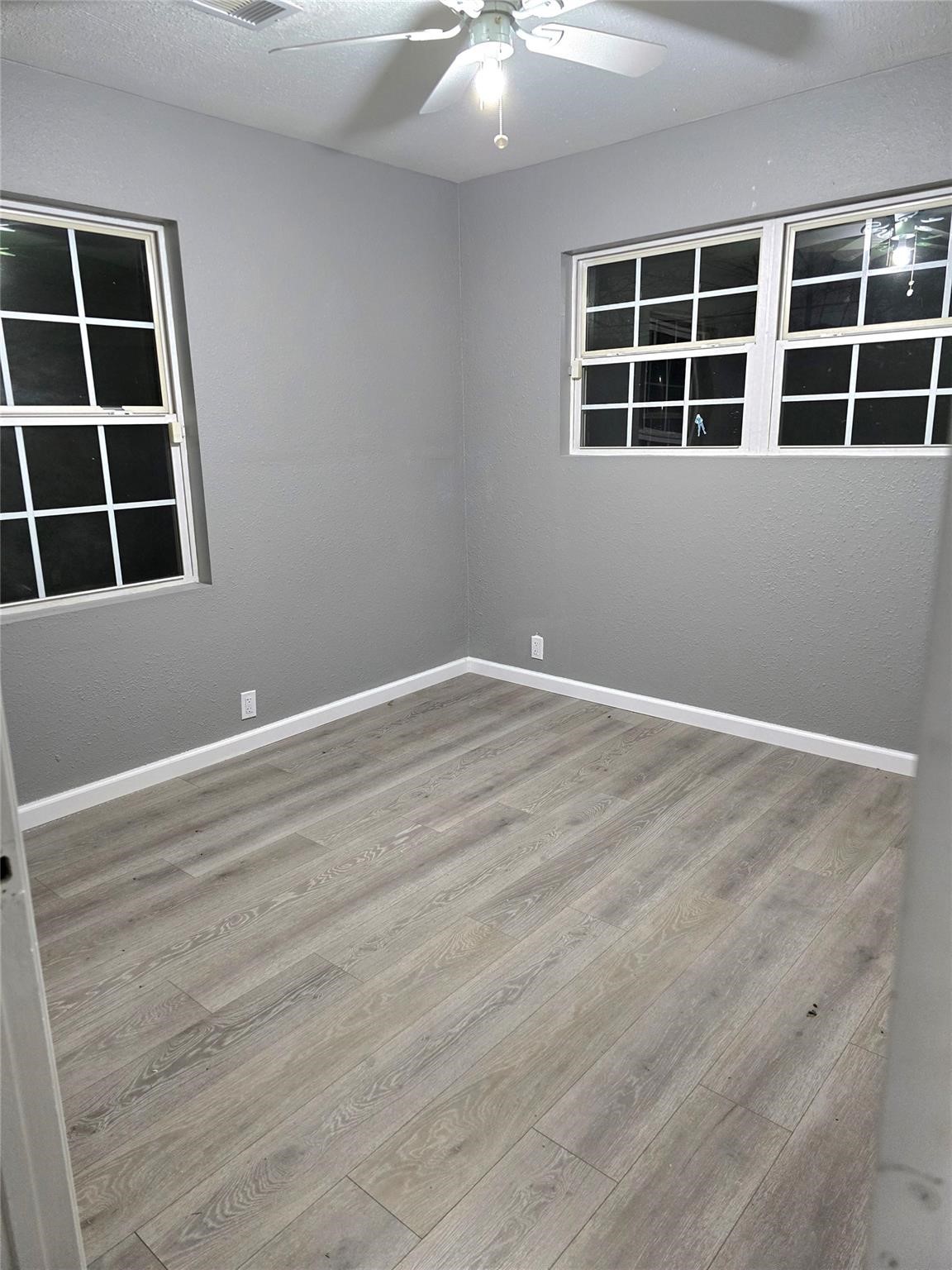 9938 Kittrell Street Houston, TX 77034 - Photo 8 of 12 a view of an empty room with a window