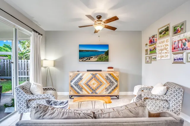 a bedroom with bed and windows