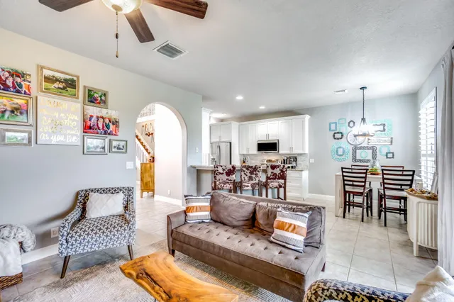 a view of a house with a backyard