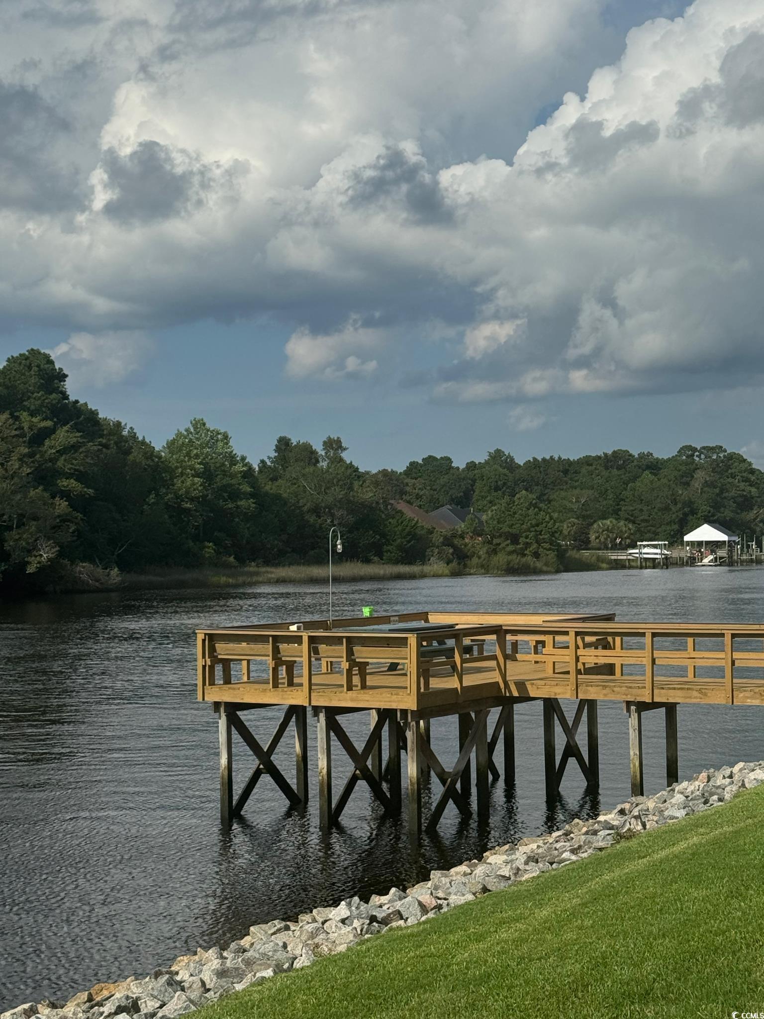 209 Landing Road, Unit H North Myrtle Beach, SC 29582 - Photo 17 of 30 Dock with a water view and a view of trees