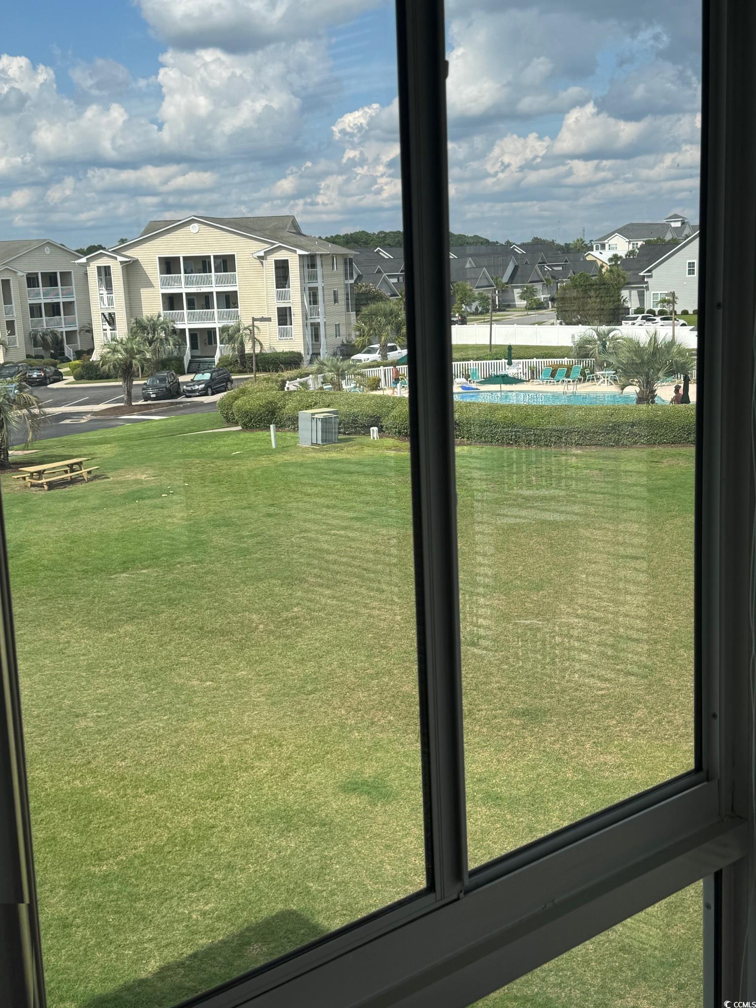209 Landing Road, Unit H North Myrtle Beach, SC 29582 - Photo 8 of 30 Exterior space with a residential view and healthy amount of natural light