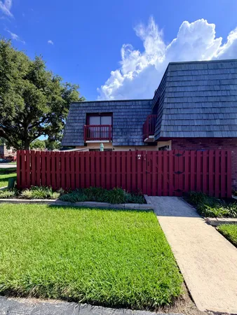 a view of yard with patio