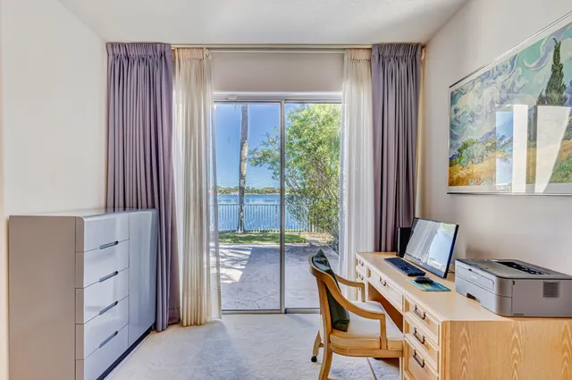 a room with furniture and a window